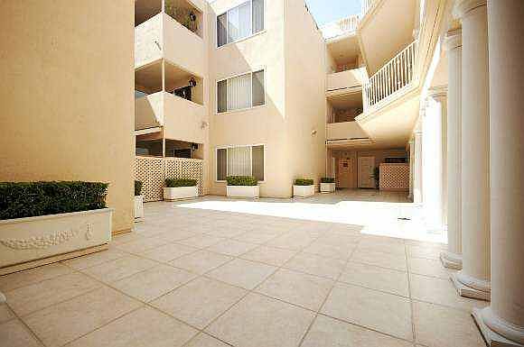 2nd image of 411 N Palm Dr APT 11