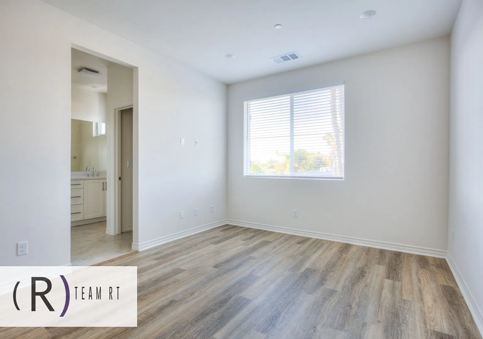Modern 4-Bedroom Tri-Level Home with EV Charging & Solar in Artesia ! — Photo 3