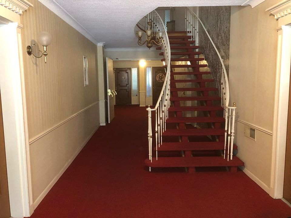 View of the front hall after entering the street-level front door.