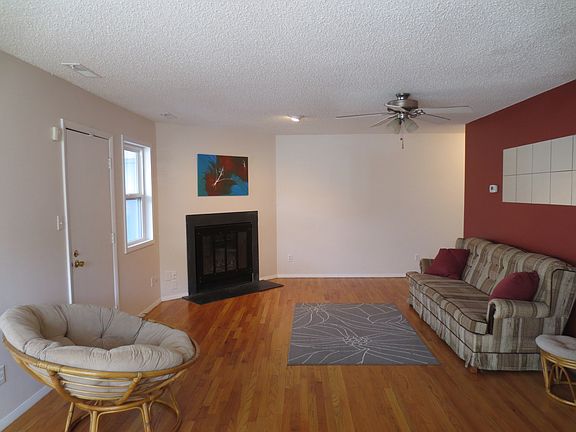 LIVING RM W/CORNER FIREPLACE