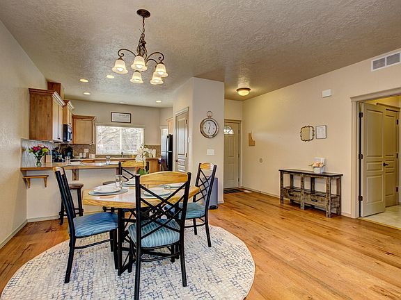 Doors to the right lead to the laundry room (washer and dryer provided) and access to garage