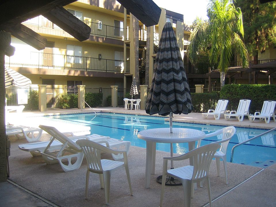 Just steps from your door! One of 4 pools in the complex.