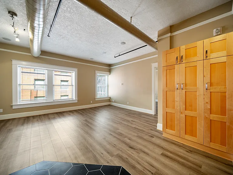 Living Room and Built-In Storage (Furnished Photos Coming Soon)