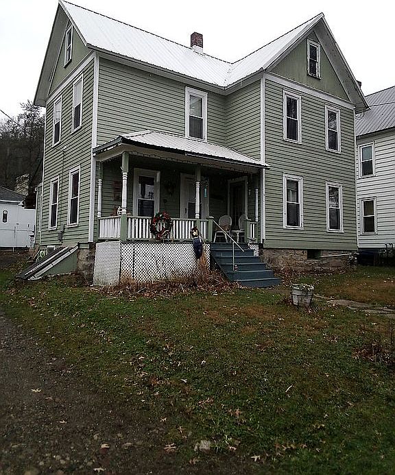 New windows and sidewalk 