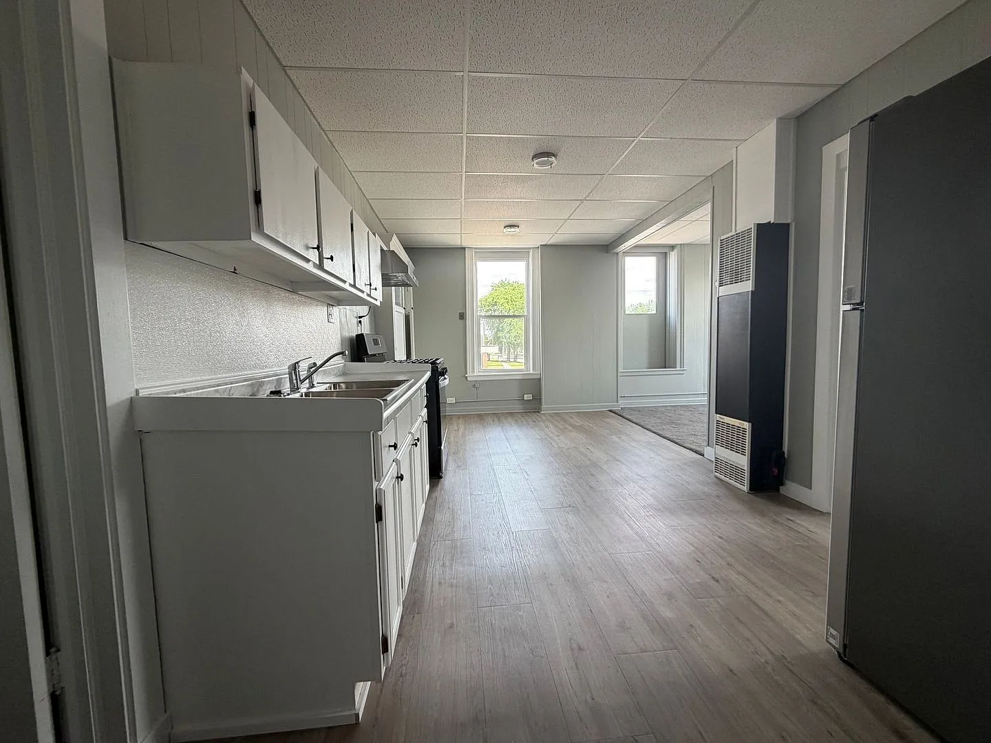 Historic Charm. Modern Comfort: Bright Spaces Updated Finishes Walkable Location — Photo 3