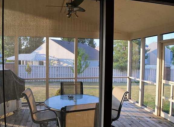 Large screened porch off breakfast room, perfect for relaxing