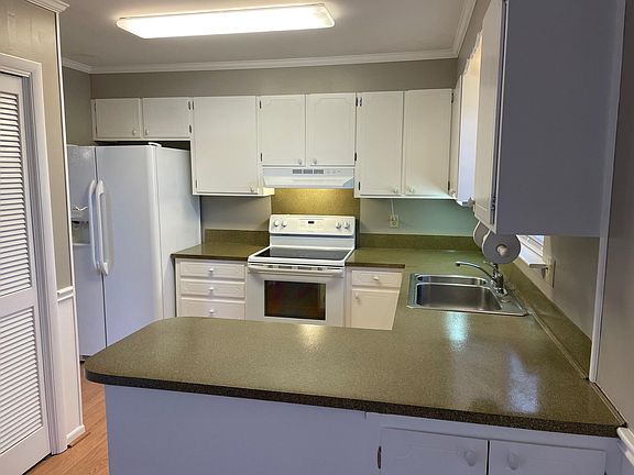 view of kitchen from eat in area, new Quartz Countertops going in today.