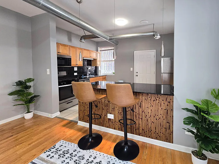 E 65th Pl — Photo 6