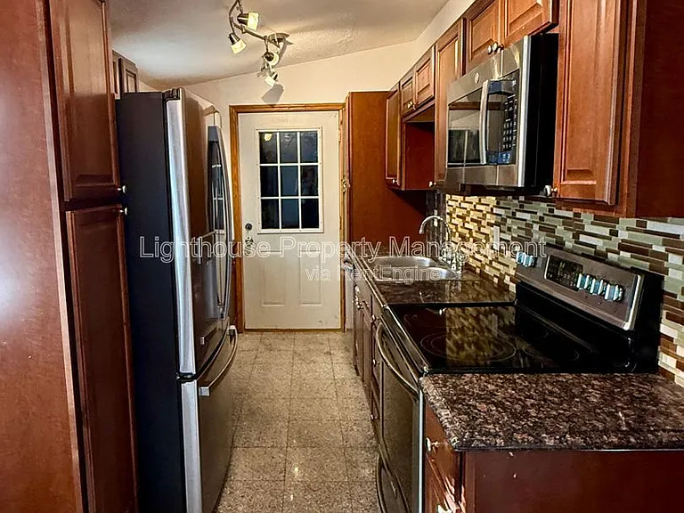 8118 Howard St — Photo 6