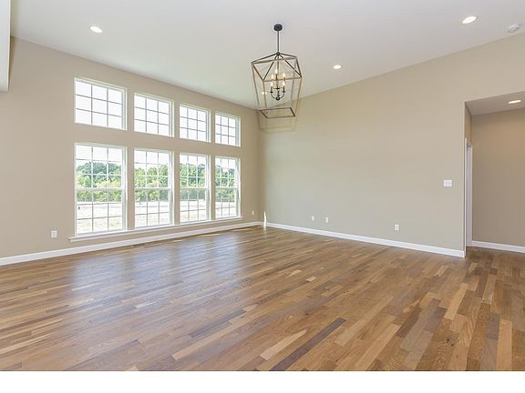 Great Room with 12 Foot Ceilings and Window Wall