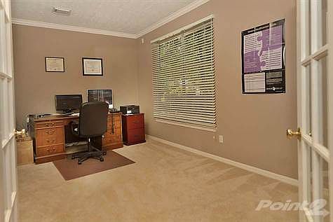 Spacious study with French doors is 17x13