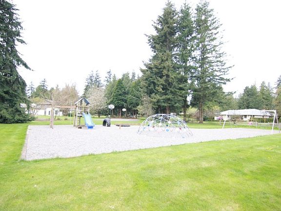 Safe and private neighborhood playground with soccer & baseball fields.