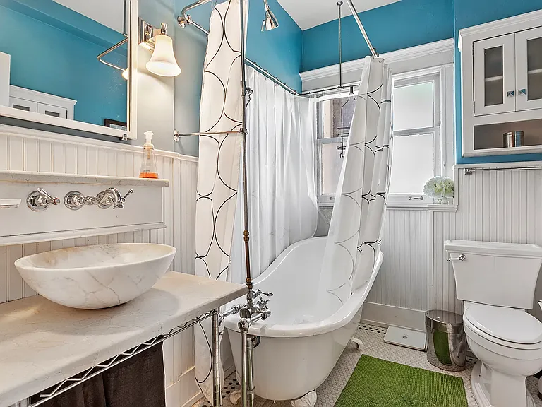 Shower only (no tub faucet any longer), heated floor for winter is nice.