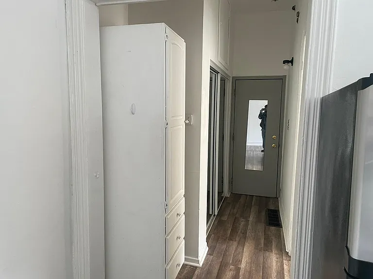 vestibule shot from living room/kitchenette