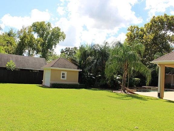 The pool house hides the pool equipment, heater and controls for the sprinkler system.