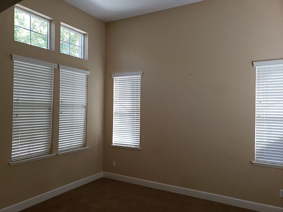 living room with 9ft ceiling