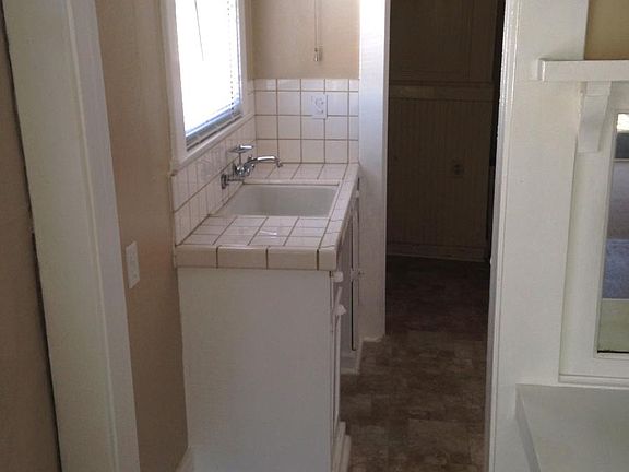 Cute Kitchen with Tile Countertop