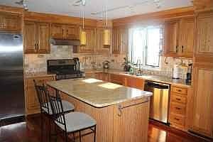 Open Kitchen with Granite and SS appliances