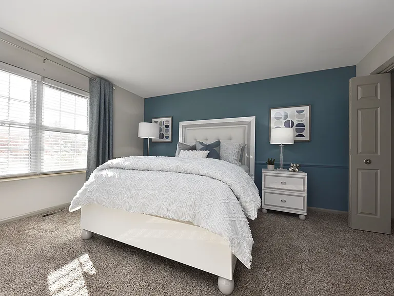 Experience tranquility in this beautifully styled bedroom, perfect for relaxation.
