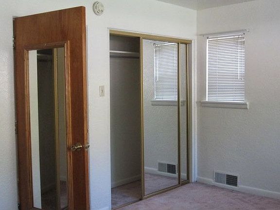 Front large bedroom with 2 double closets