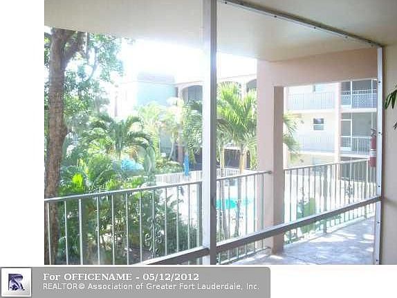 2nd image of 100 SE 6th Ave APT 209