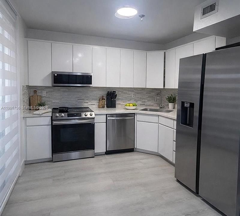1st image of 671 NE 195th St #219