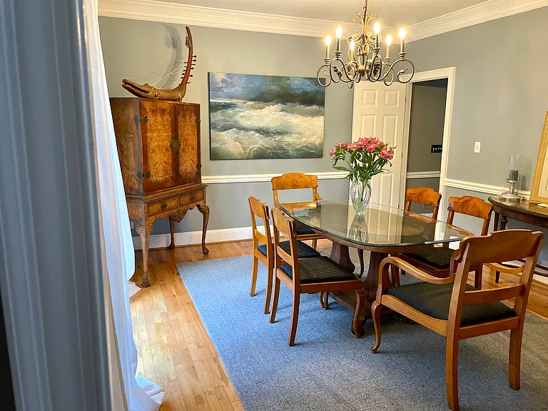 Dining room off foyer and kitchen.