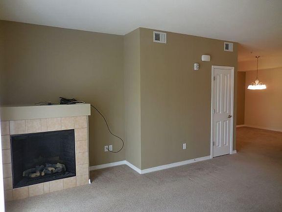 Living room with electric remote controled fireplace
