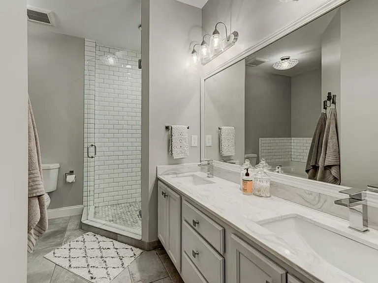Master bathroom, double vanity with shower and tub.