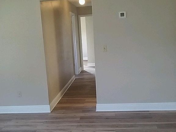 Looking from great room into entry hallway and front door