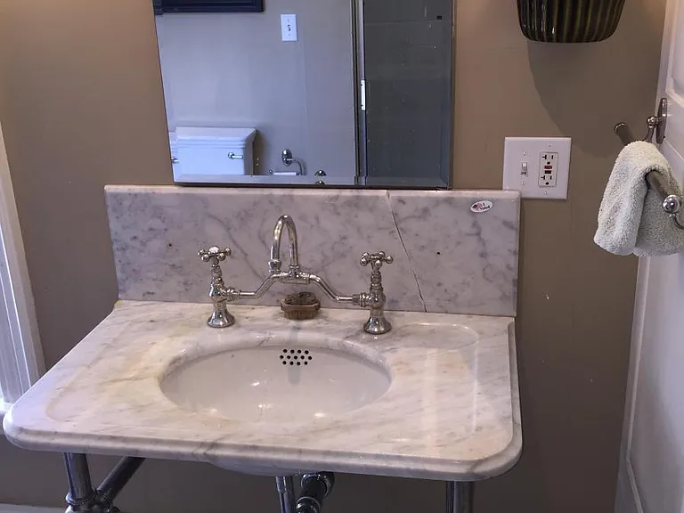 antique china bowl and marble sink with pewter legs