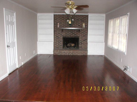 Family Room book Shelves and Fireplace