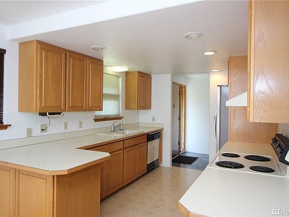 Light and Bright kitchen - all appliances stay.