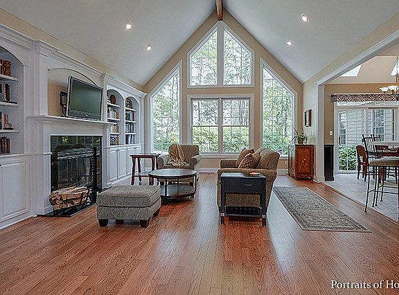 Fantastic room w/vaulted ceiling, recessed lighting, gorgeous hardwood flooring & spectacular view!