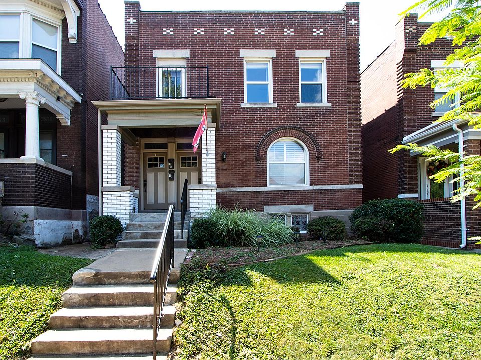 Front Yard. Door on left to 2nd floor unit.