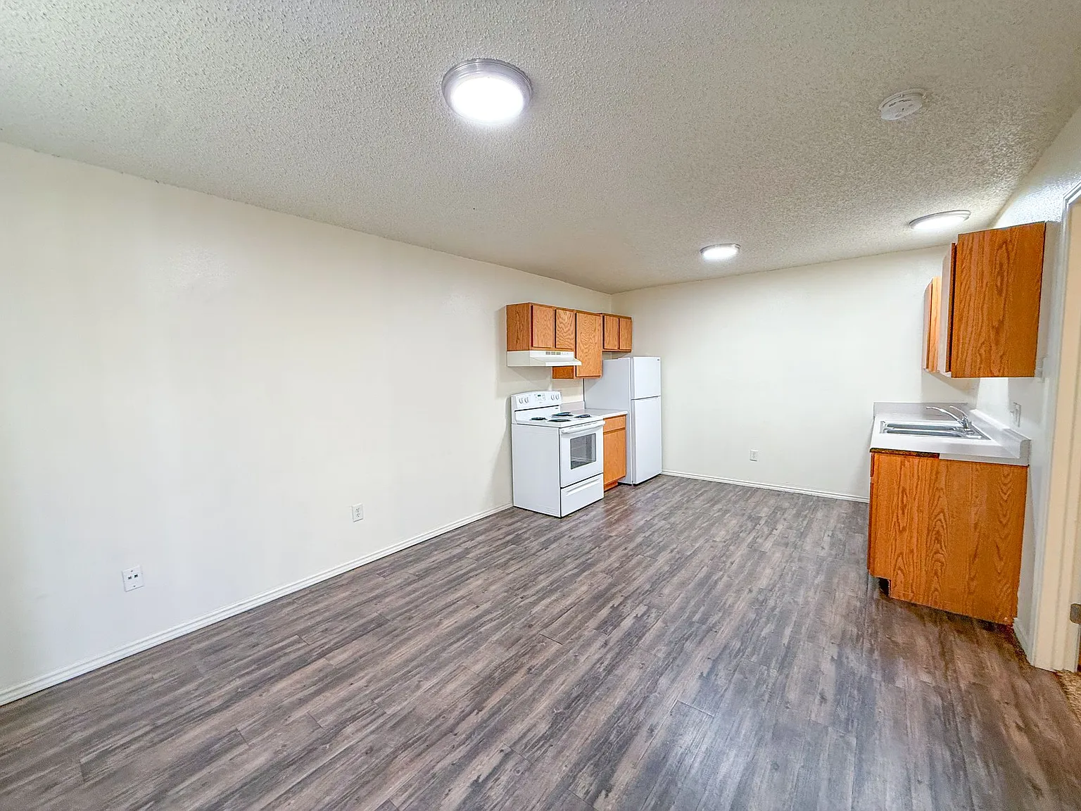 New West Apartments — Photo 1