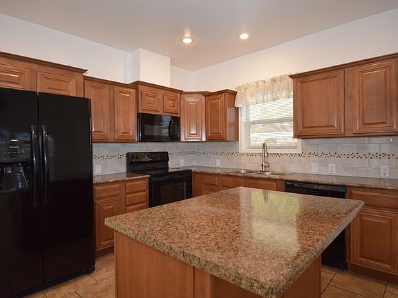 4th image of 9675 E 38th Pl