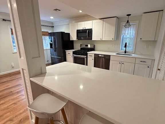 bar seating and kitchen