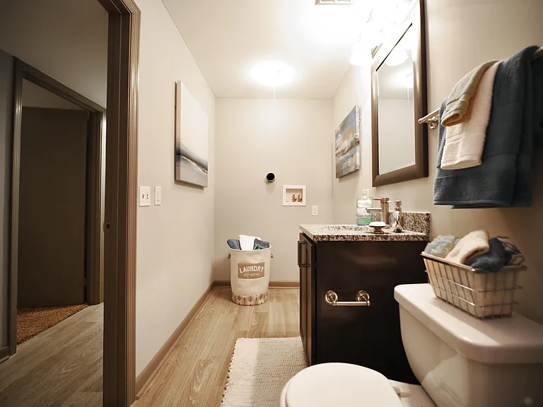 Bright bathroom with granite counters