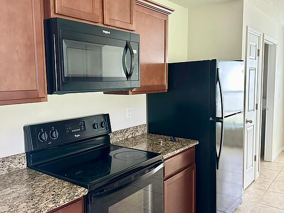Eat In Kitchen features granite, pantry and breakfast bar