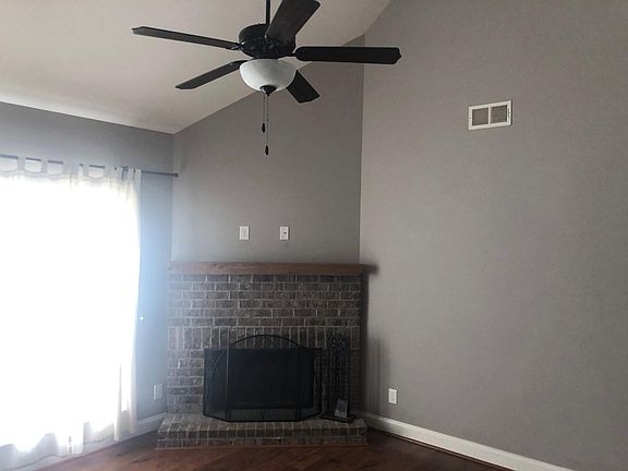 Den with fireplace