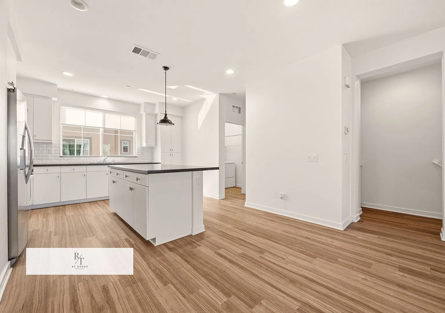 Modern 3-Bedroom Condo with Flexible Multi-Level Layout in Pomona ! — Photo 1