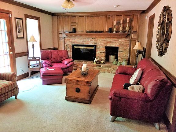 Lg fireplace & Hearth in den