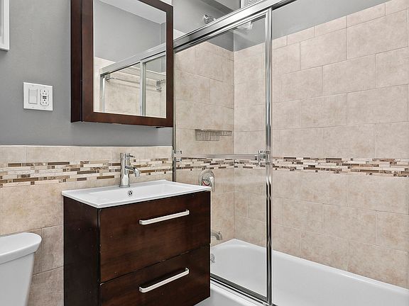 5th image of 77 E 12th St APT 6D
