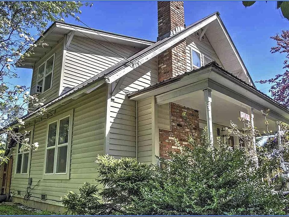 Roomy Front Porch and sideyard that can be used to park a trailer. Single, gravel-covered, off-street parking available.