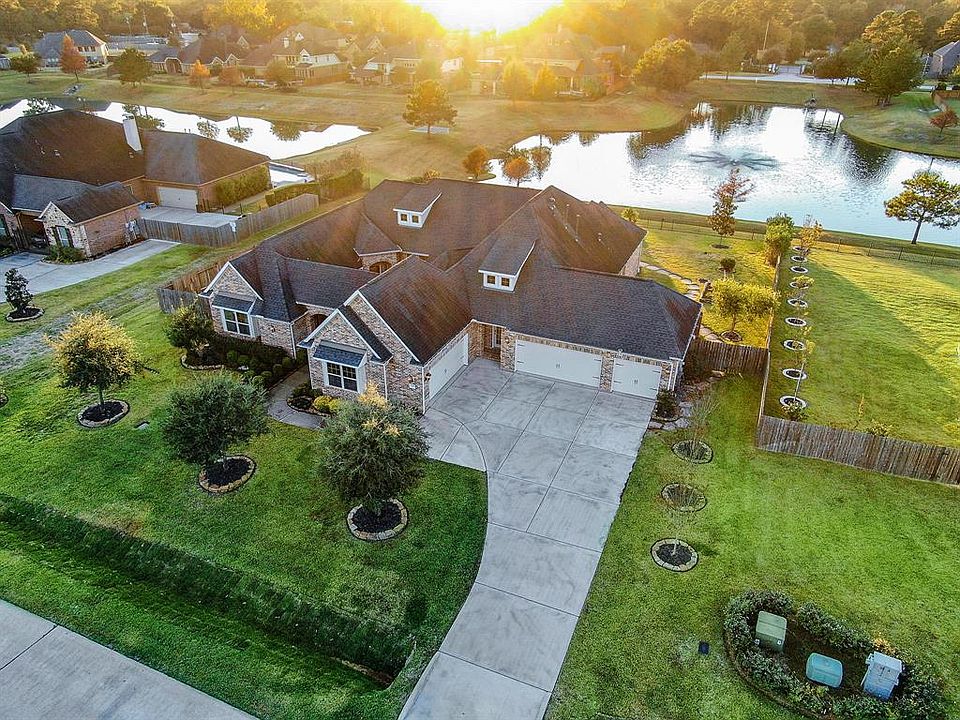 Gorgeous one story in a gated community with a pool and lakeview.