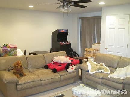Basement Family Room
						:
						Wide view of family room. Storage to left and to right. Walkout to patio.