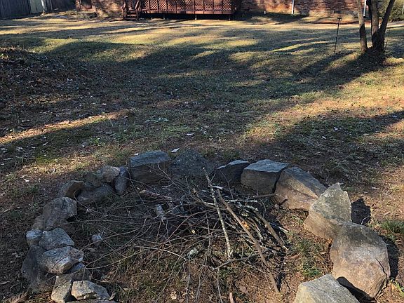 Back of house with deck