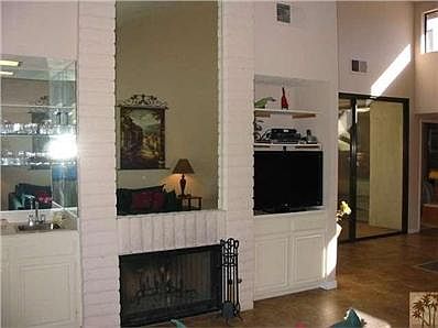 Great room fireplace and wet bar.