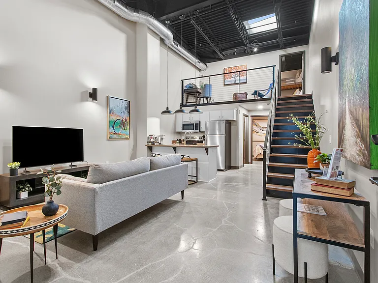 Step inside and look up- this 2 bed, 1 bath stunner brings the wow from floor to loft. Open living, sleek kitchen, skylit workspace, and stainless steel everything.